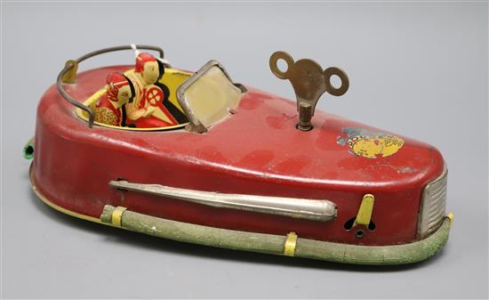 A Buffalo Toys tinplate Dodgem bumper car length 26cm